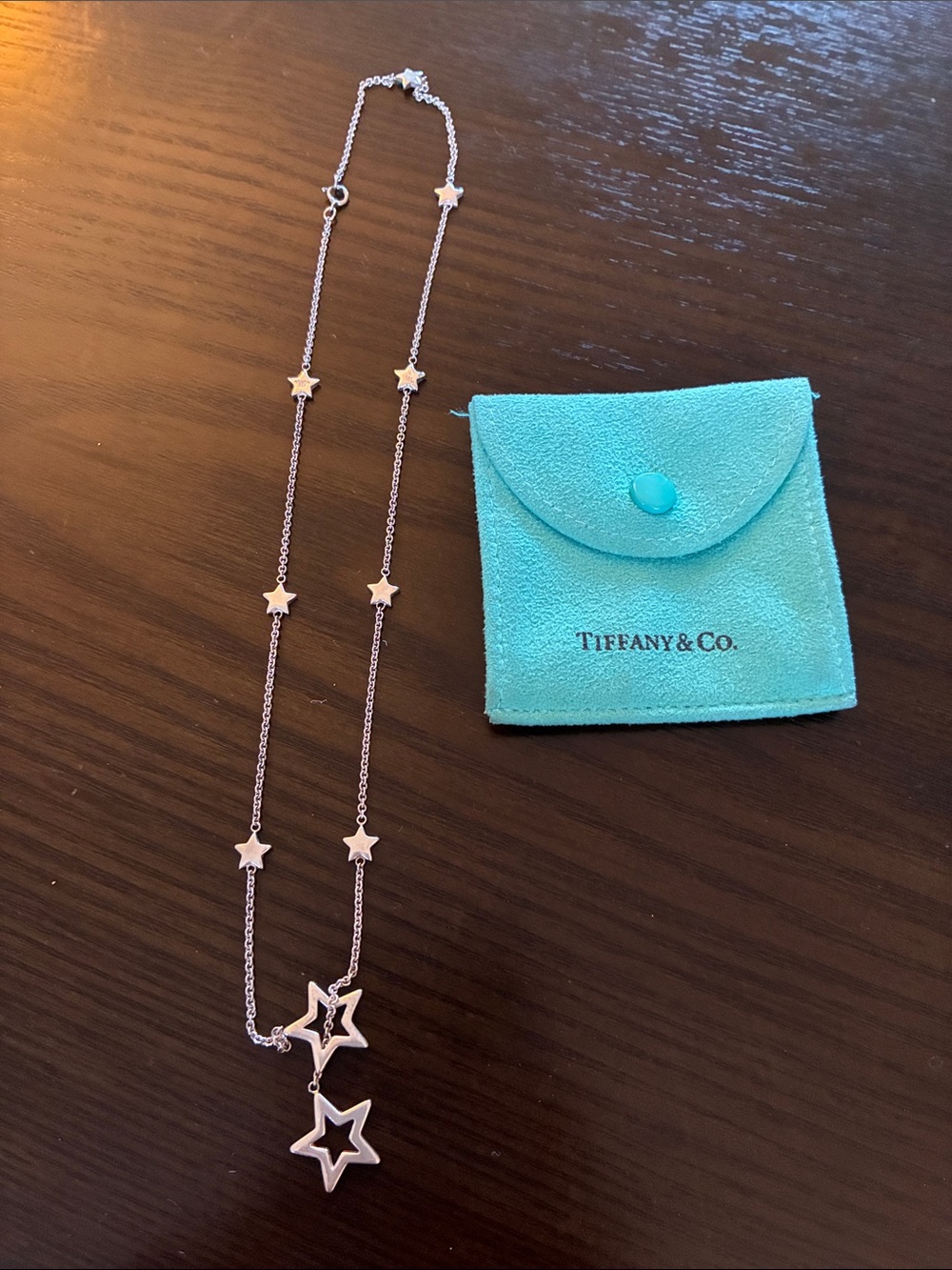 Tiffany & Co. Silver Star Charm Necklace with Blue Pouch
